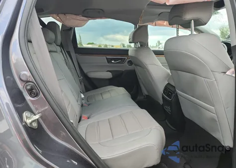 2017 Honda Cr-V Touring z USA, uszkodzony, nr VIN 5J6RW1H97HL016859